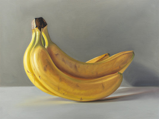 This artwork features a bunch of bananas resting on a light surface.