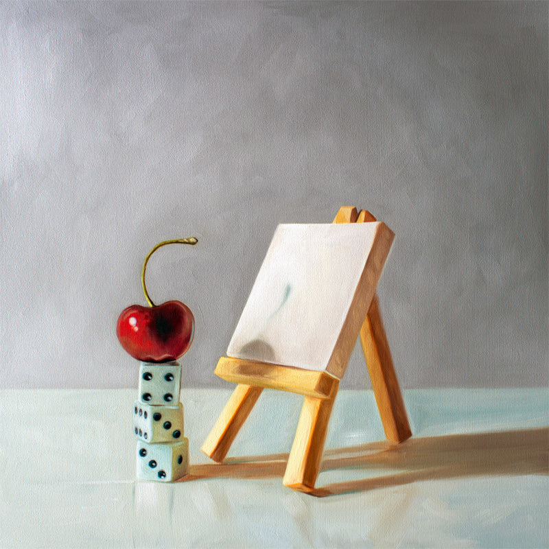 This artwork features a bright red cherry in front of a mini blank canvas on a mini easel seemingly having a case of ‘Artist’s Block’.It goes without saying that all artists can almost certainly relate to the little guy!