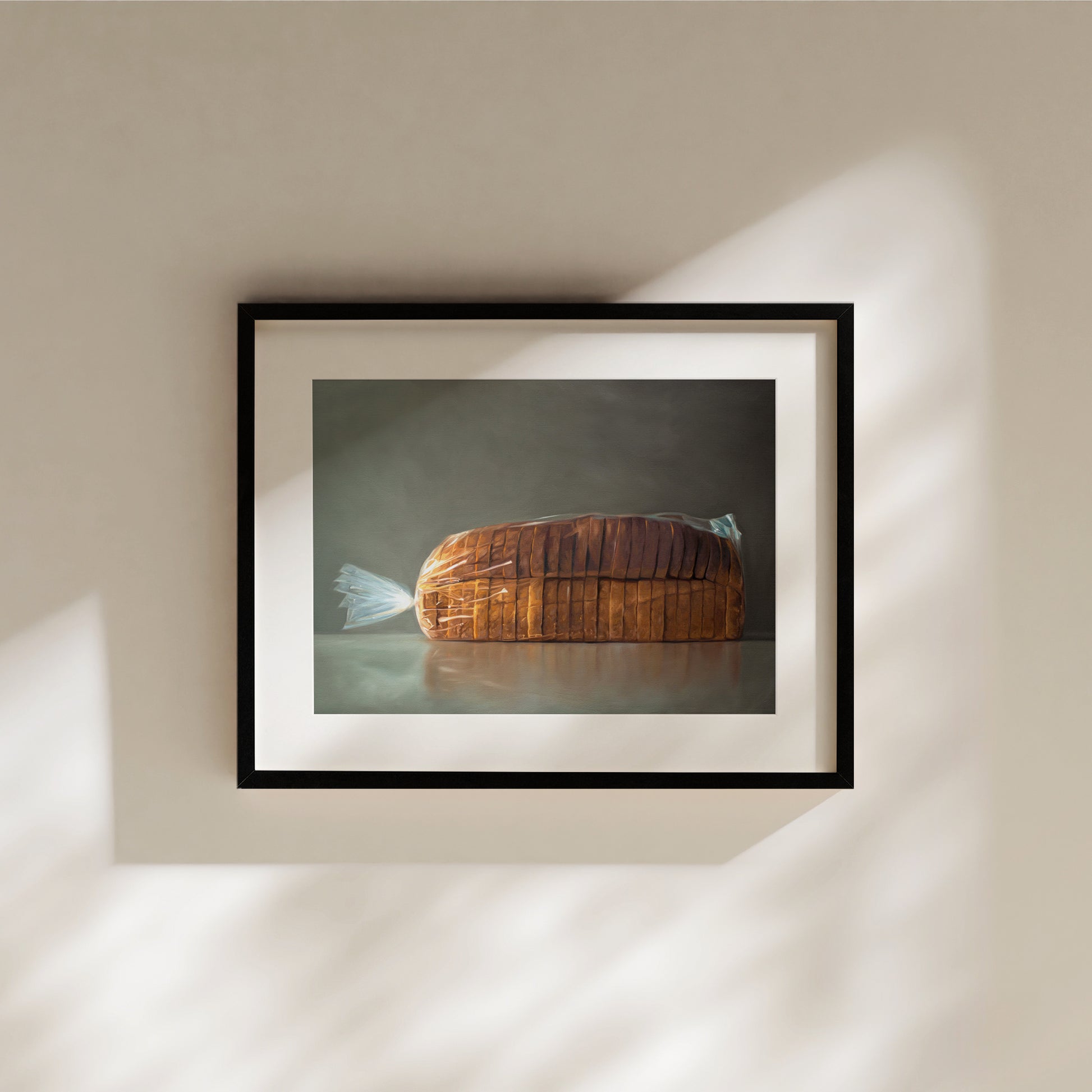 This artwork features a fresh loaf of bread in clear plastic wrap on a medium grey background.