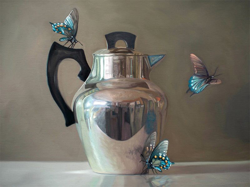 This artwork features a trio of blue butterflies surrounding a vintage tea kettle.This artwork is from a series featuring tea kettles paired with various objects.