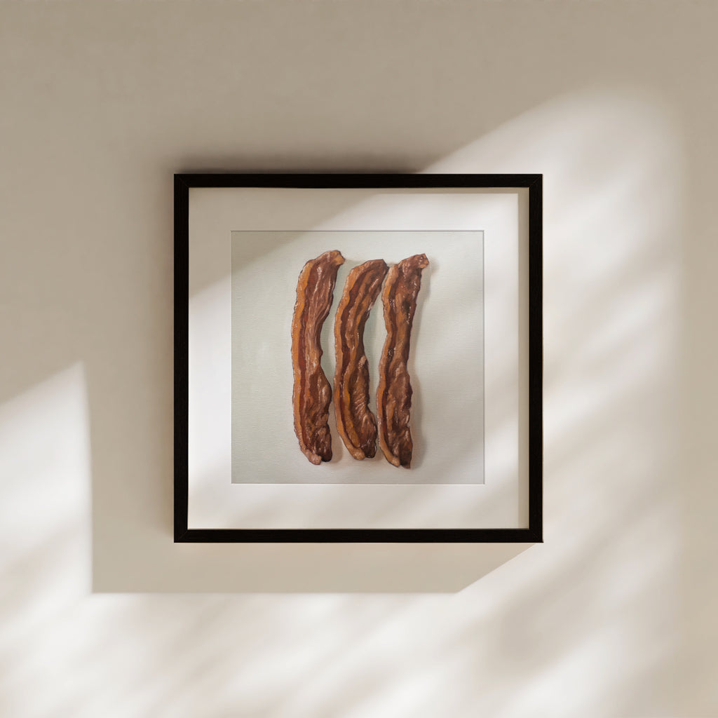 This artwork features a trio of freshly fried bacon strips.