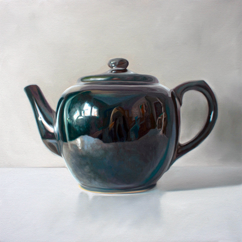 This artwork features a reflective black teapot resting on a light reflective surface and grey background.