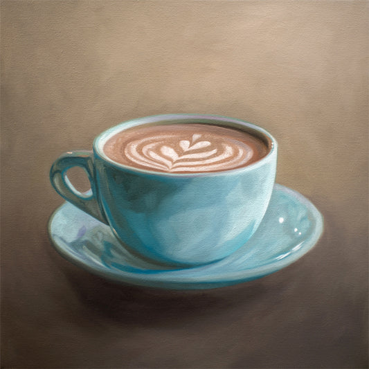 This artwork features a single blue coffee cup filled to the brim lan artful latte.