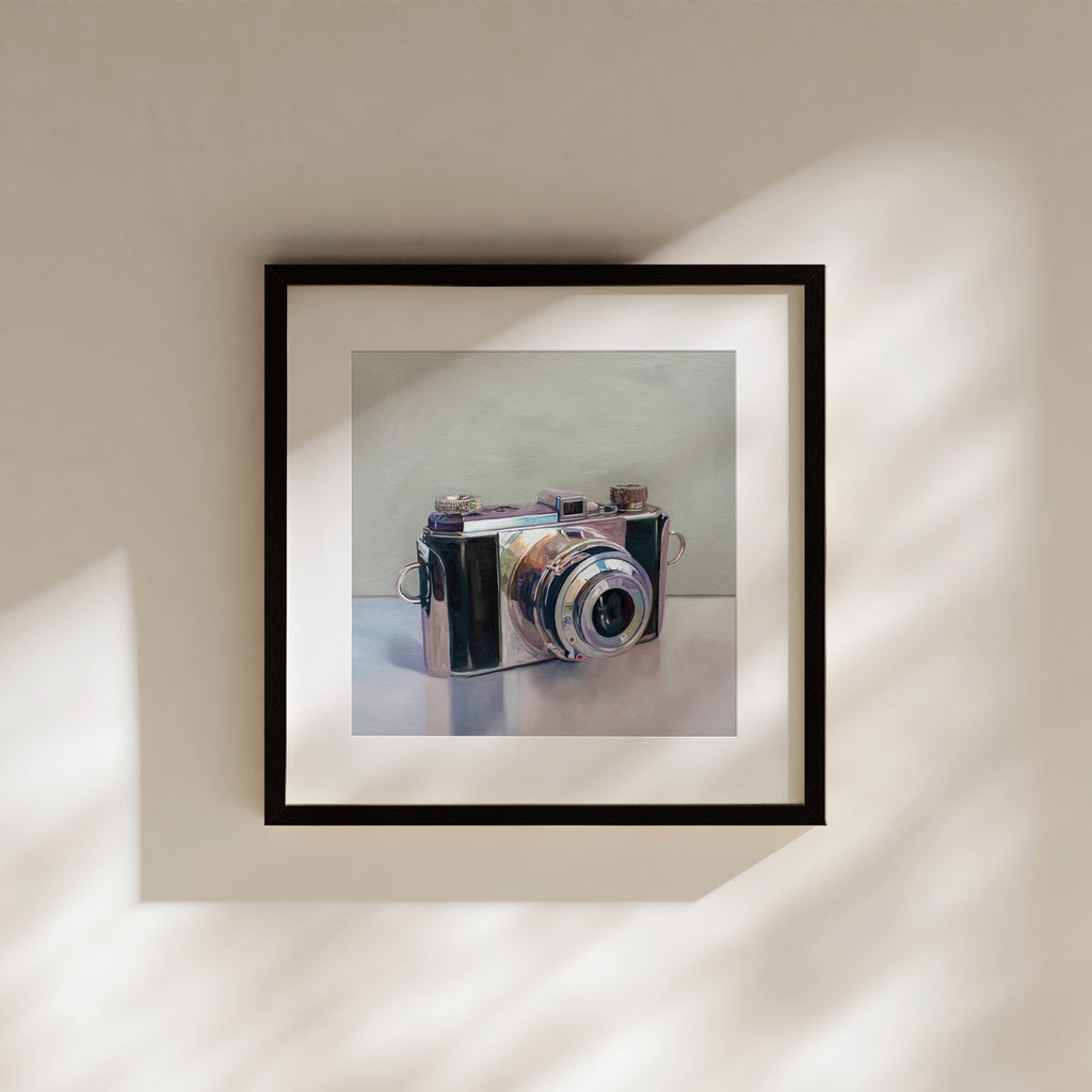 This artwork features a vintage 35mm film camera painted in loose painterly brushstrokes.