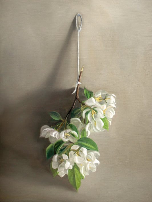 This artwork features a branch of crabapple blossoms hanging adjacent to a warm grey surface.