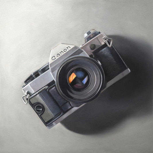 This oil painting features a vintage Canon AE-1 camera resting on a neutral surface with dramatic side lighting.