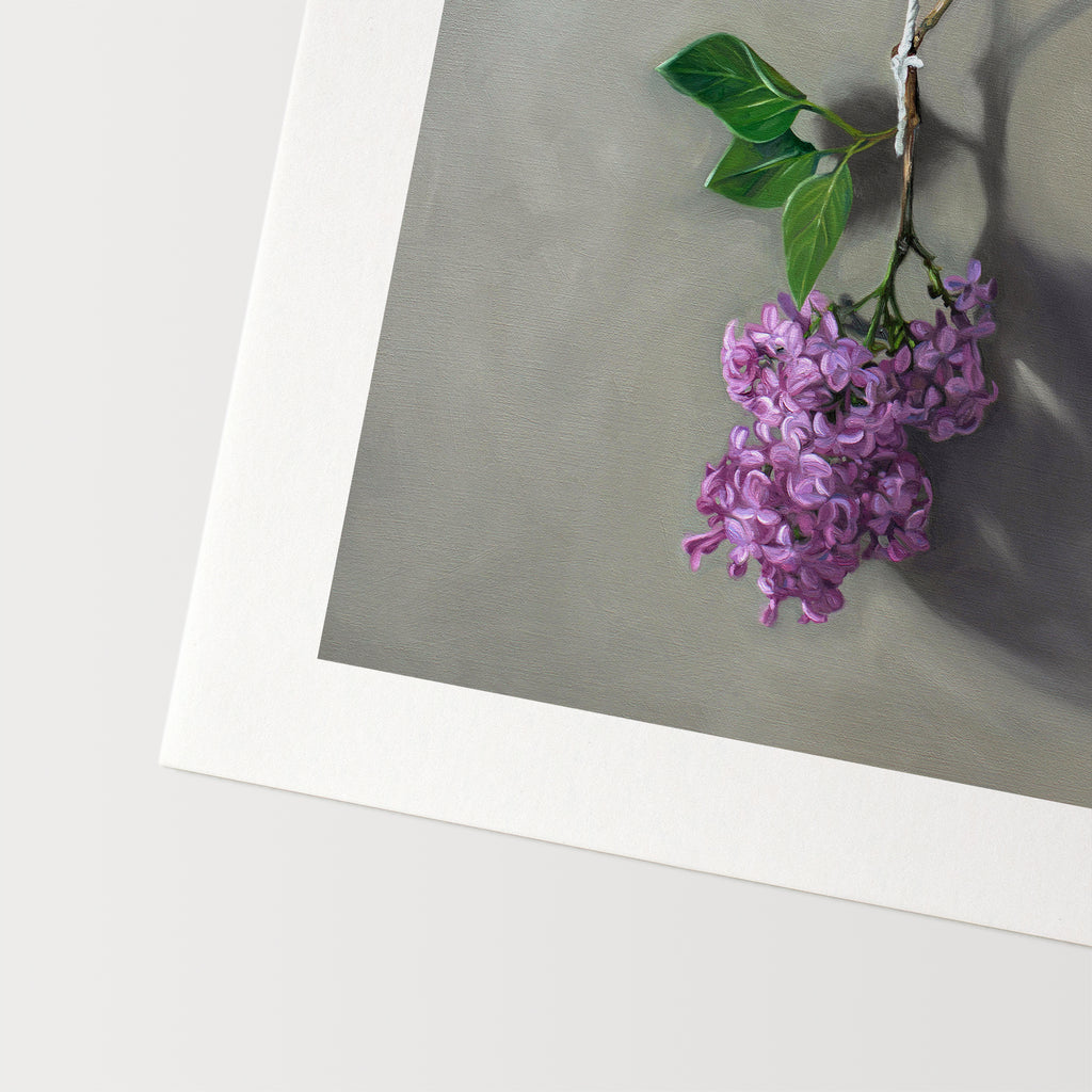 This artwork features Lilac blossoms hanging adjacent to a wall.