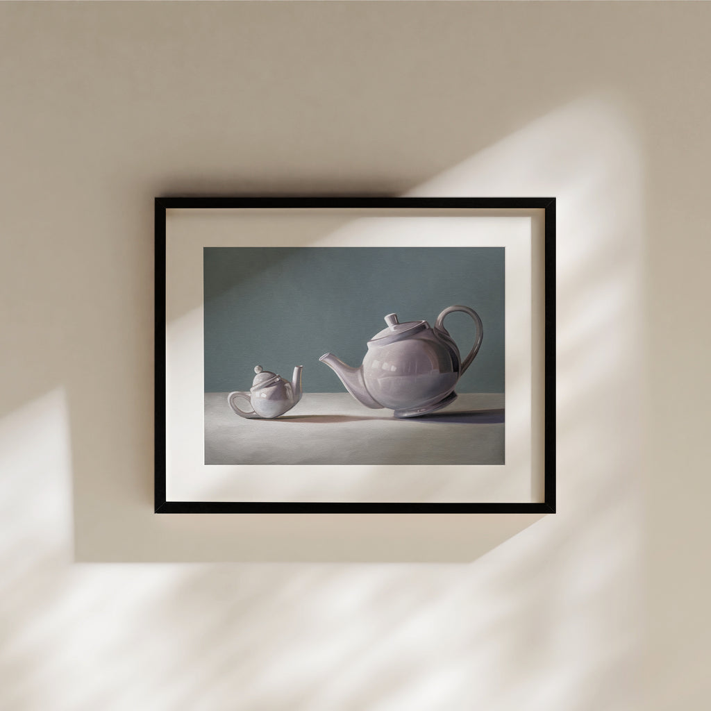 This artwork features teapot curiously inspecting its little bitty counterpart.