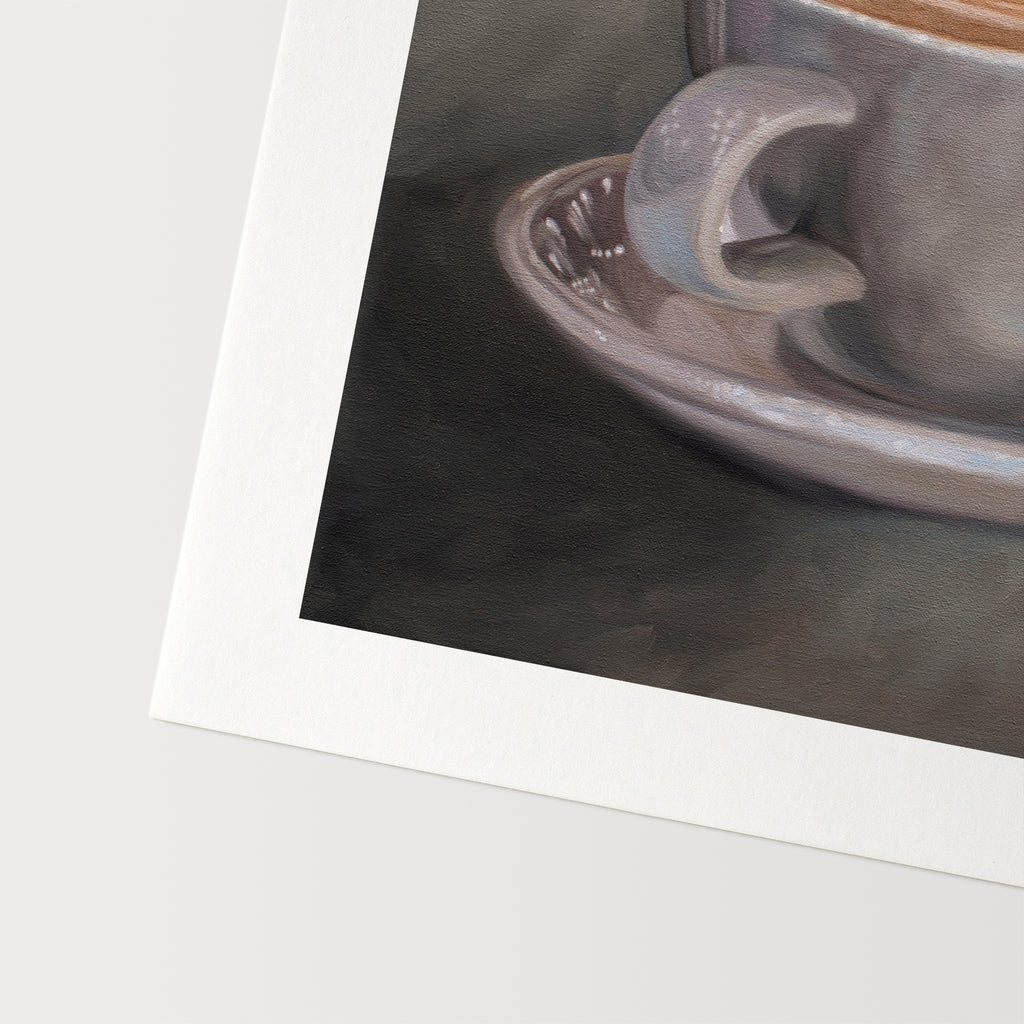 This artwork features a coffee cup filled to the brim with an artful latte.