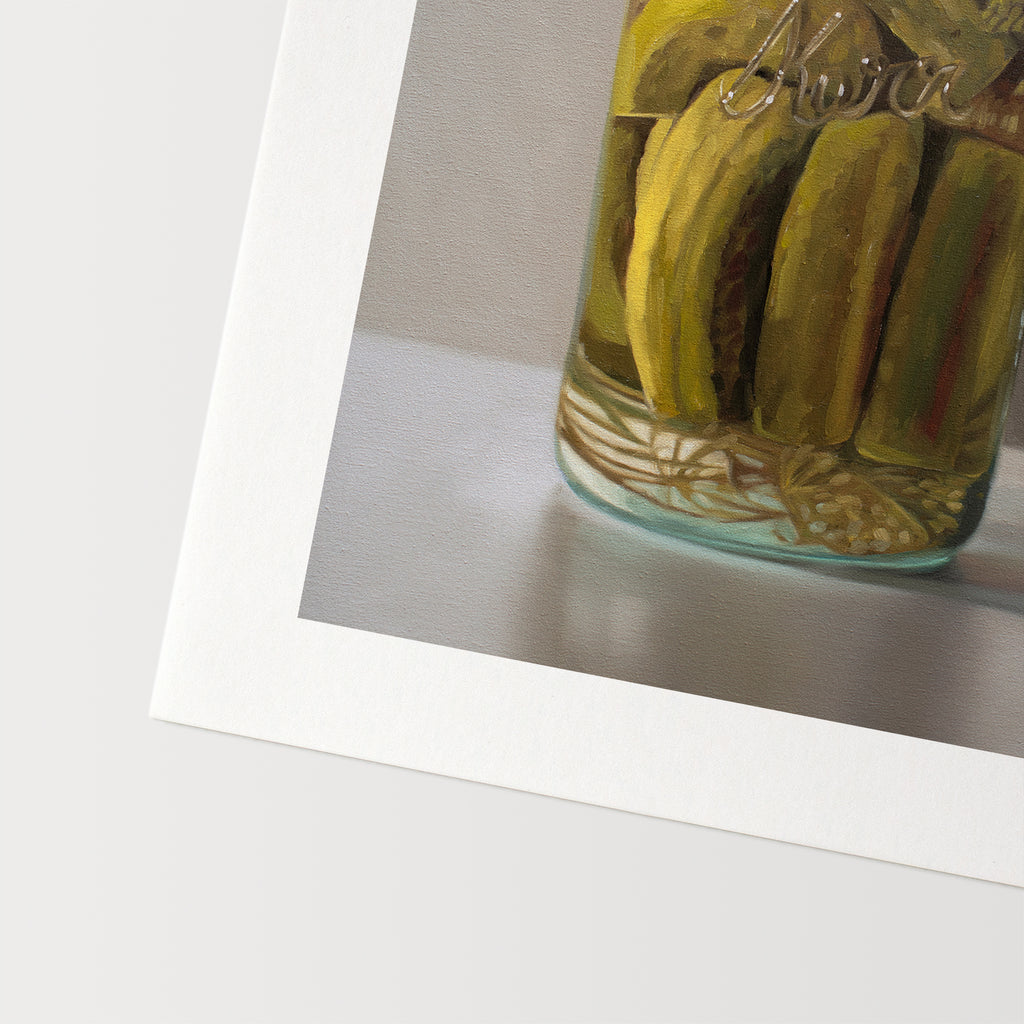 This artwork features a jar of homemade pickles, fresh from the garden.