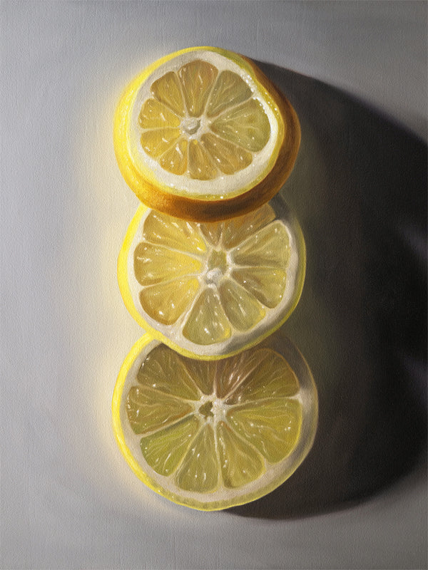 This artwork features a trio of lemon slices situated on a light grey surface with some nice dramatic side lighting.