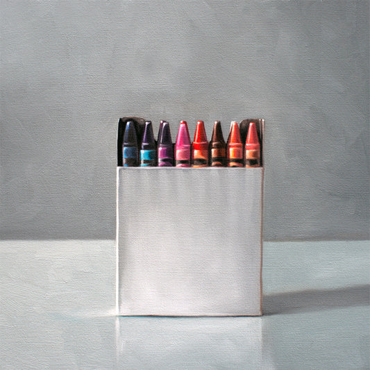 This artwork features a simple white box of crayons resting on a light reflective surface.