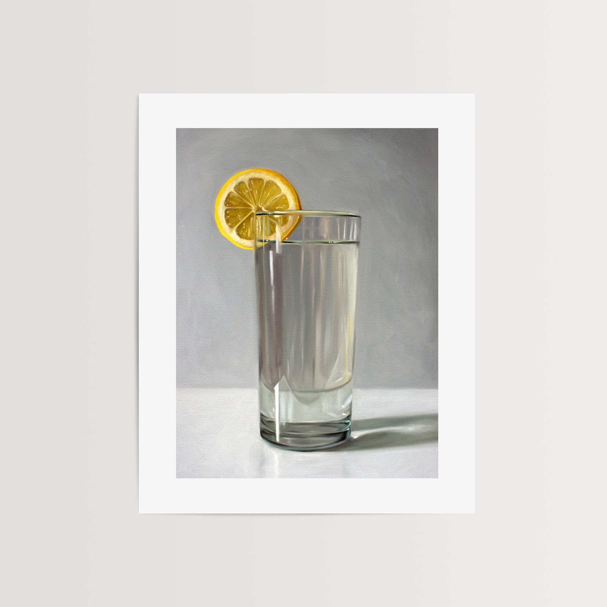 This artwork features a glass of water with a lemon slice resting on a light grey surface with dramatic lighting.