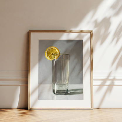 This artwork features a glass of water with a lemon slice resting on a light grey surface with dramatic lighting.