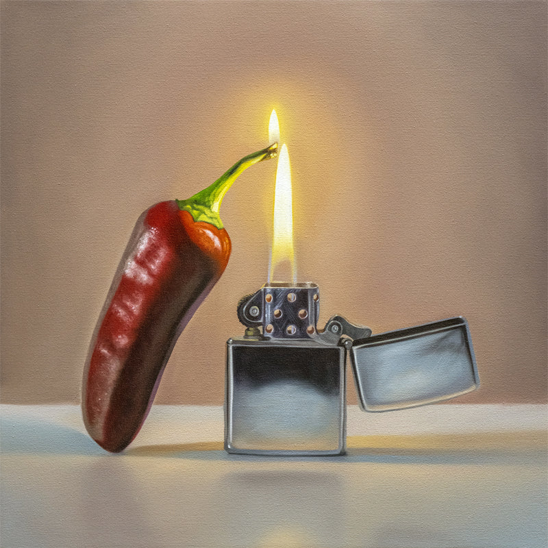 This artwork features a red hot Jalapeño with its stem catching fire from a reflective Zippo lighter.