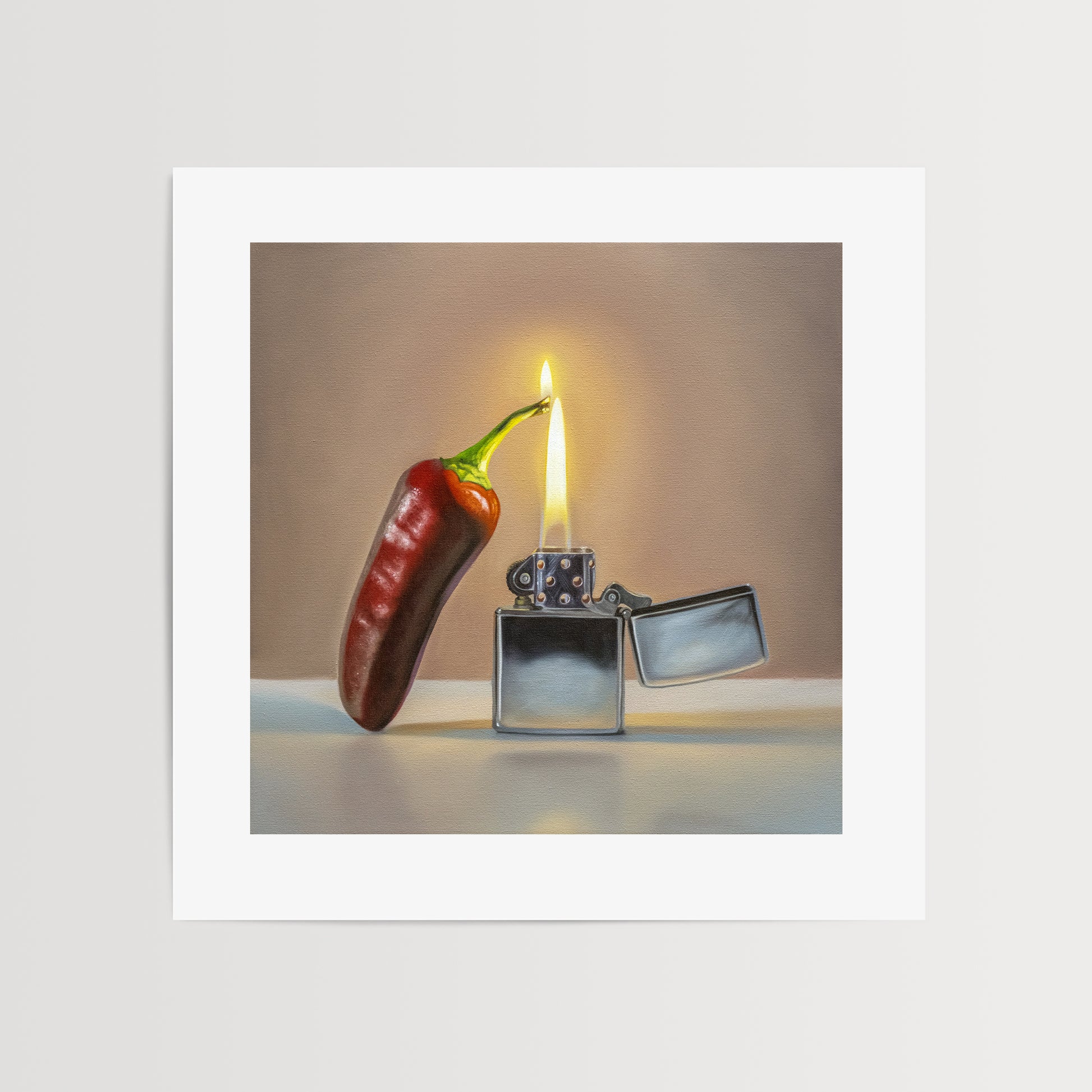 This artwork features a red hot Jalapeño with its stem catching fire from a reflective Zippo lighter.