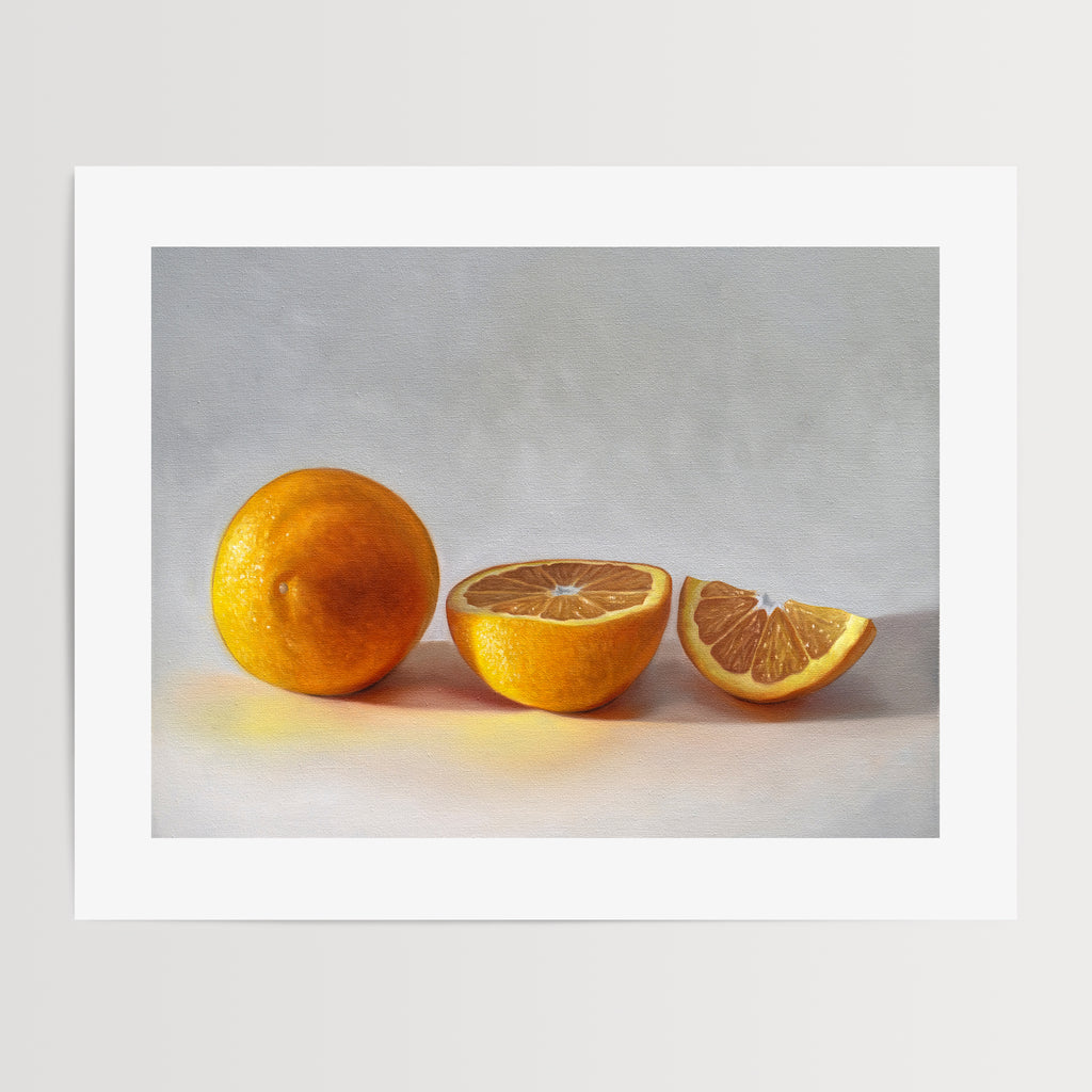 This artwork features a whole orange, half orange, and quarter slice of an orange resting on a light surface.