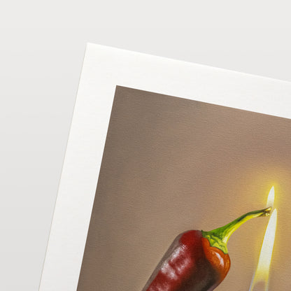 This artwork features a red hot Jalapeño with its stem catching fire from a reflective Zippo lighter.