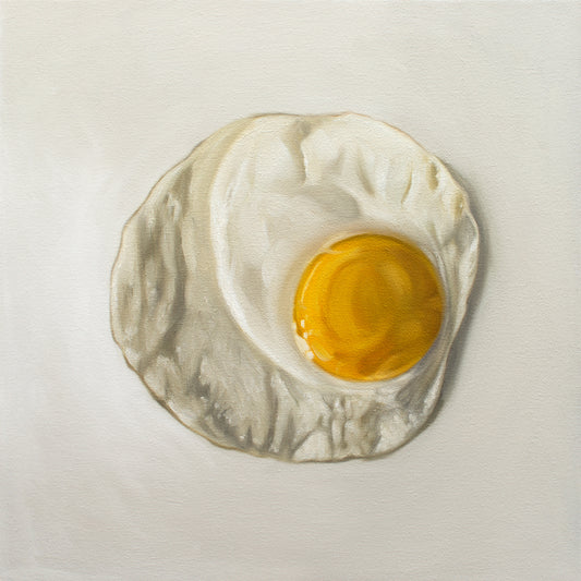 This artwork features a freshly fried egg.