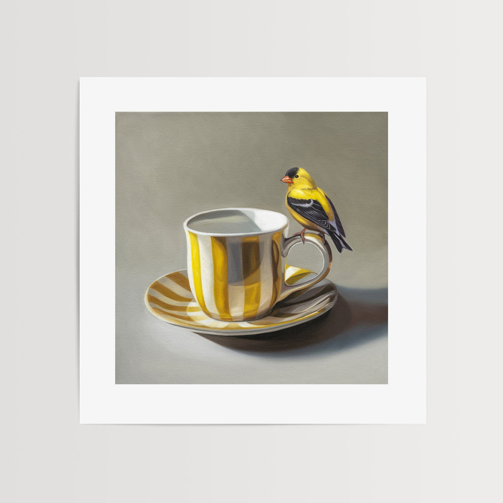This artwork features an American Goldfinch perched on the handle of a whimsical yellow and white striped cup with saucer.