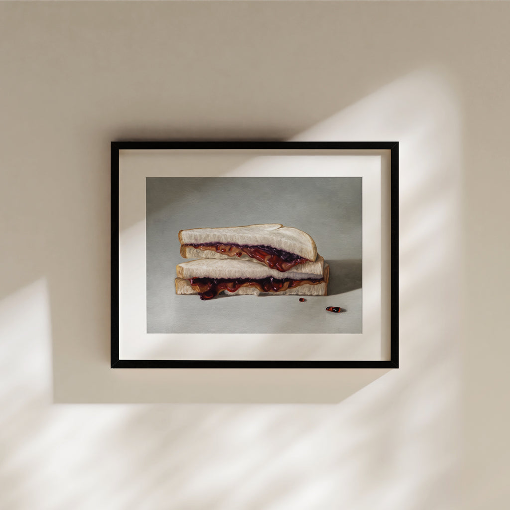 This artwork features a stacked peanut butter and jelly sandwich resting on a neutral grey surface.