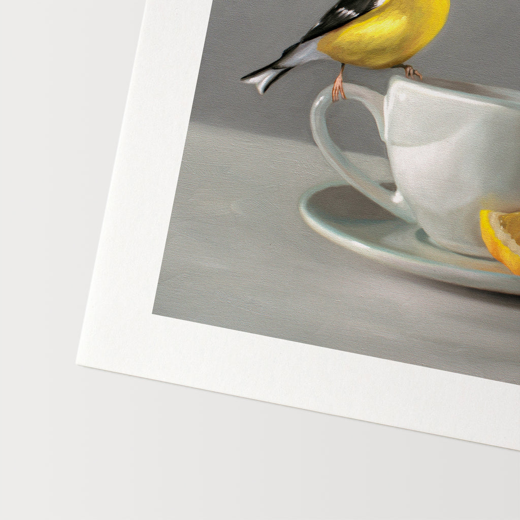 This artwork features an American Goldfinch perched on a cup of lemon tea.This artwork is from a series of paintings that I am working on featuring birds and beverages.