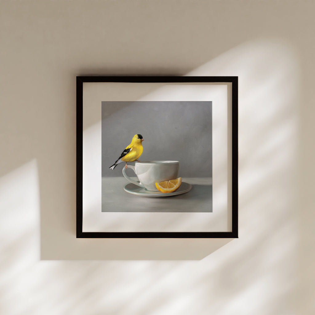 This artwork features an American Goldfinch perched on a cup of lemon tea.This artwork is from a series of paintings that I am working on featuring birds and beverages.