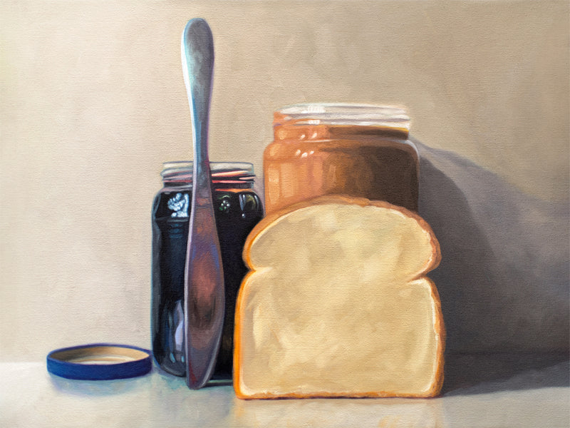 This artwork features all the things required to make a peanut butter and jelly sandwich lined up and ready to go on a light and neutral backdrop with subtle reflections.