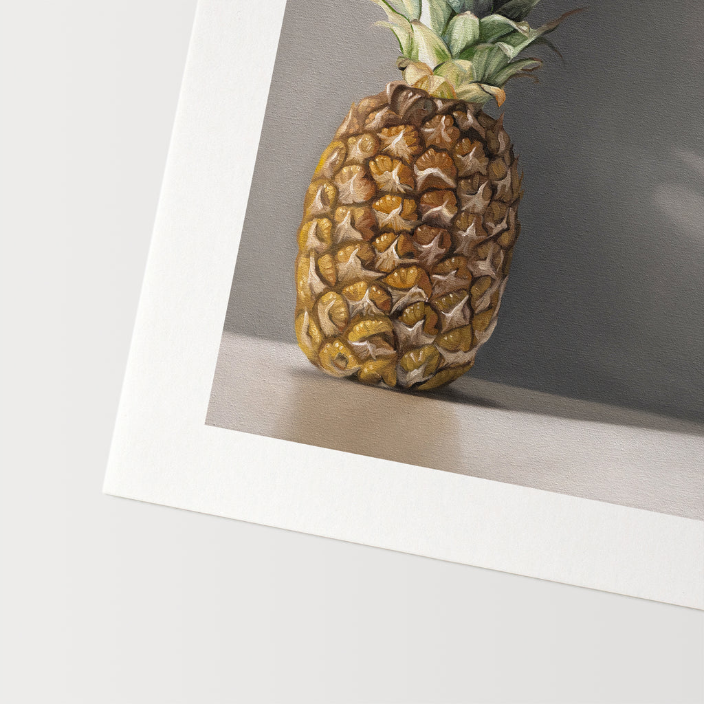 This artwork features a pineapple resting directly in front of a neutral grey wall with dramatic side-lighting creating interesting cast shadows.