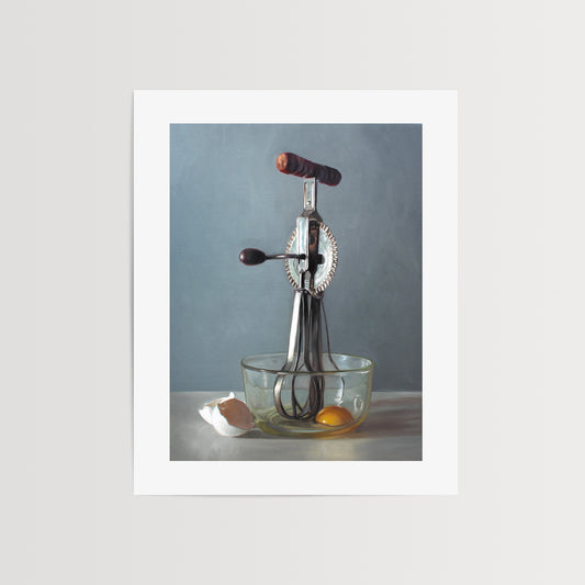 This artwork features an antique egg beater and a glass bowl containing an egg white the white shells juxtaposed on the left.