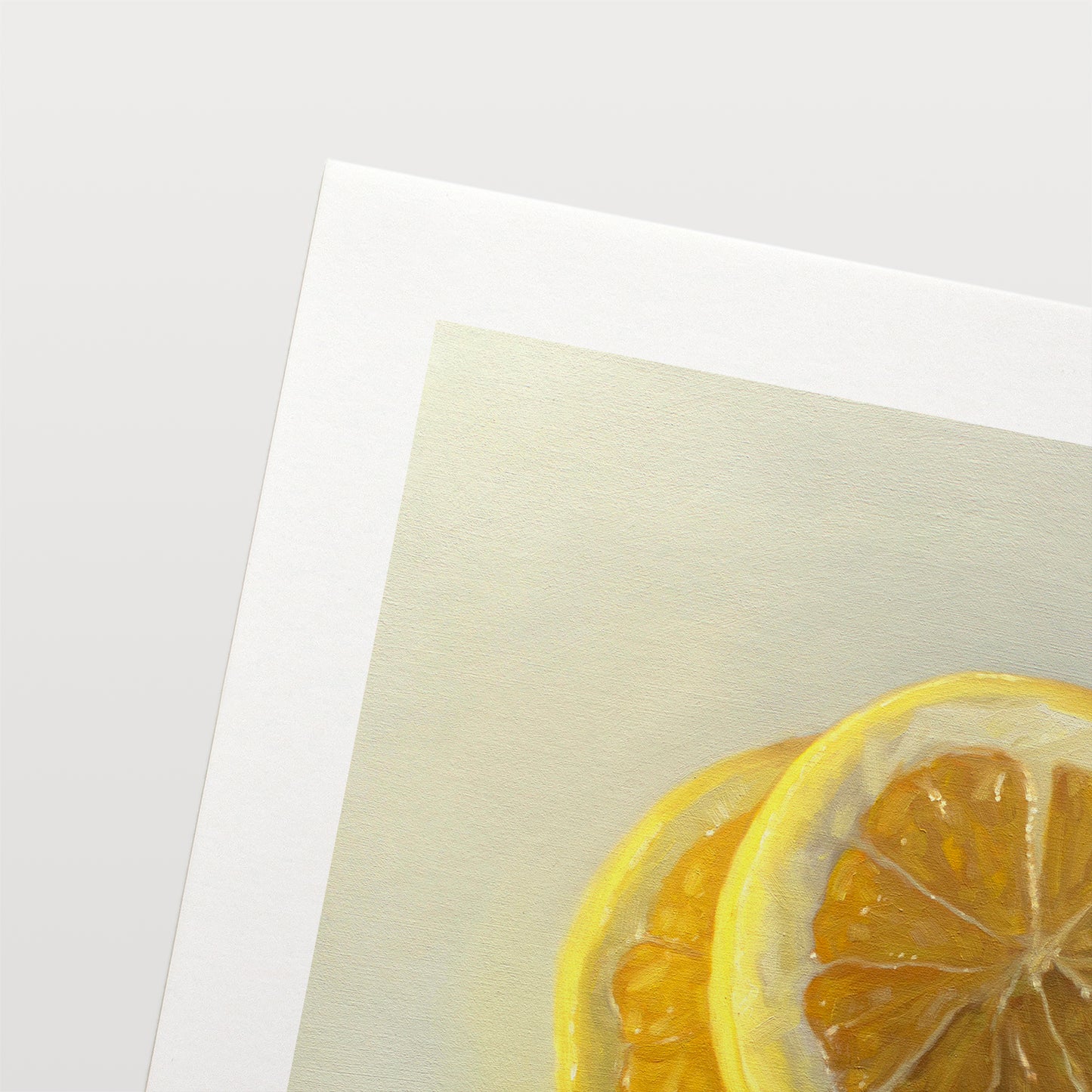 This artwork features a trio of lemon slices stacked on one another.