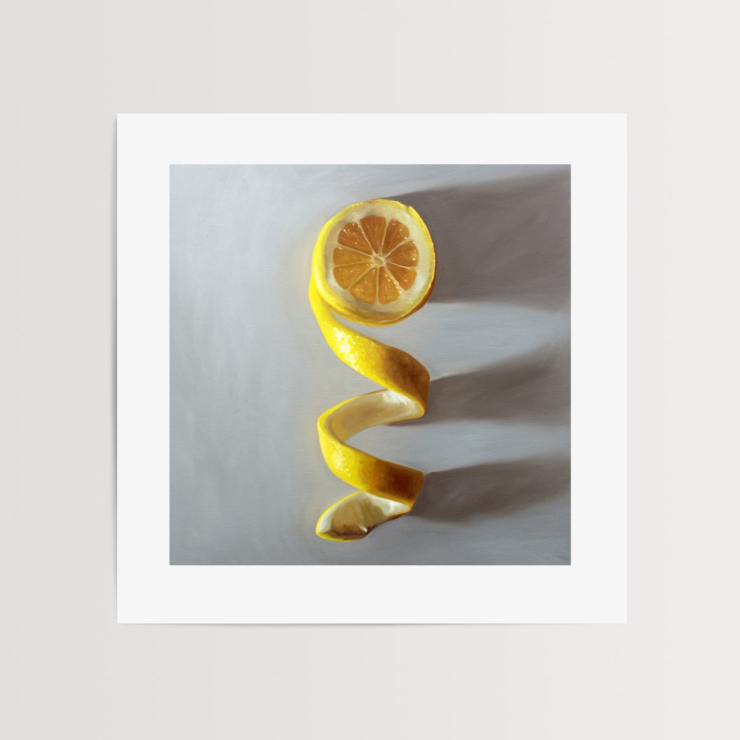 This artwork features a lemon half with its peeling twisting downward.