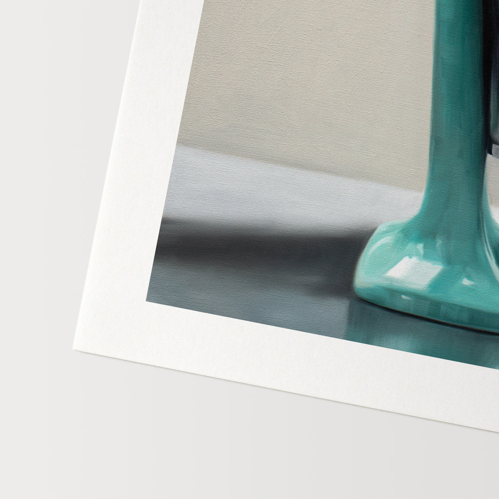 This artwork features a vintage turquoise milkshake mixer resting on a light reflective surface and grey background.