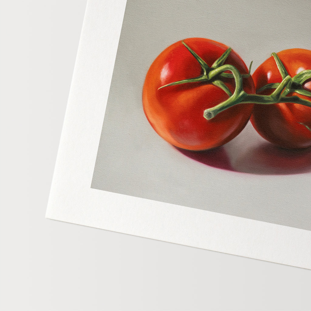 This artwork features a trio of tomatoes still on the vine, resting on a light surface with some nice dramatic lighting.