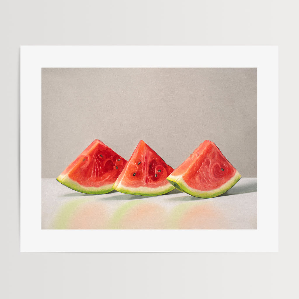 This artwork features a freshly sliced trio of watermelon wedges lined up on a reflective surface with some nice dramatic lighting.