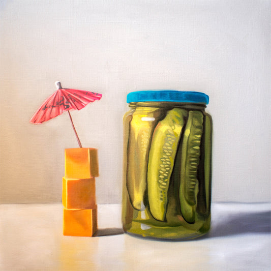 This artwork features a glass jar of pickles alongside a stack of cheese cubes relaxing under a drink umbrella.