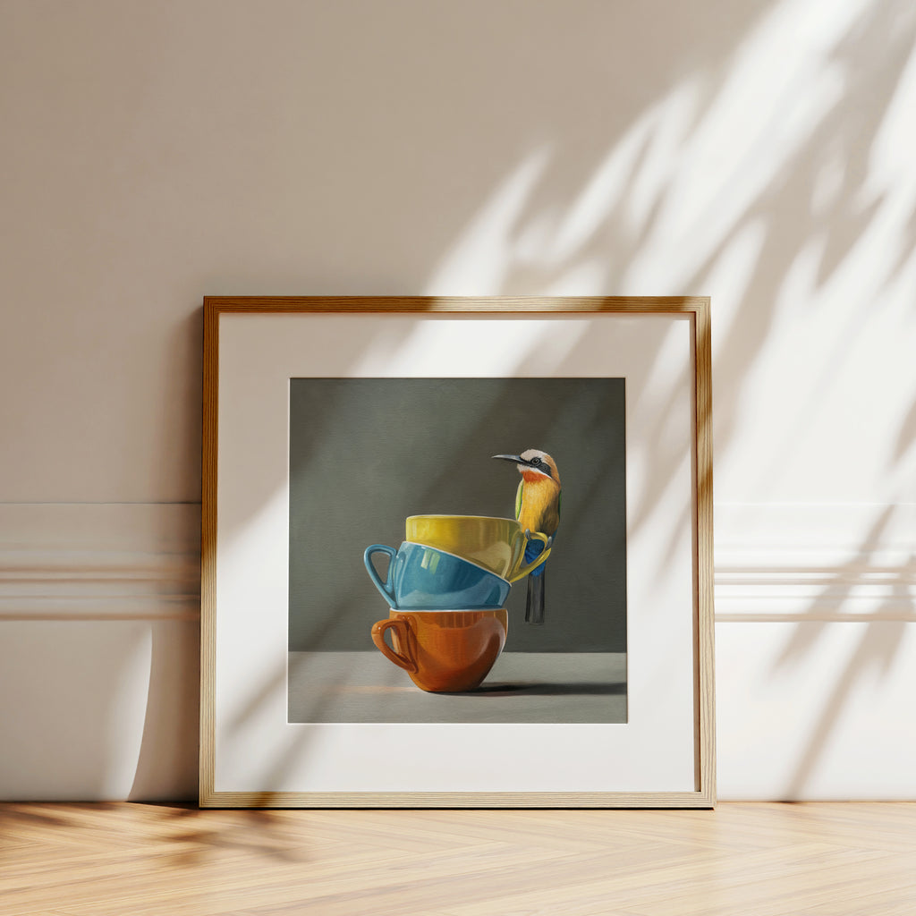 This artwork features a White Fronted Bee Eater perched on top of a stack of colorful coffee cups.