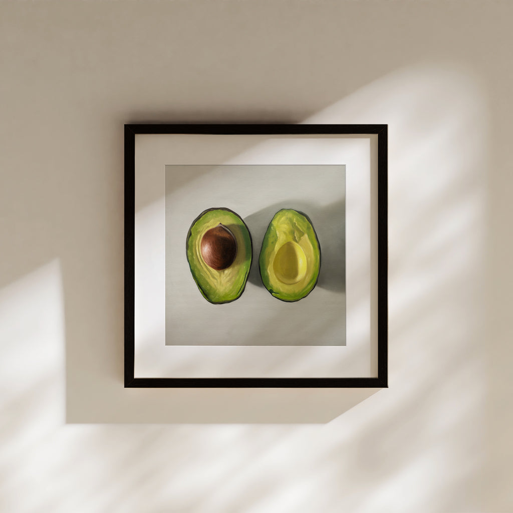 This artwork features a single avocado sliced in half and viewed from above on a light surface.