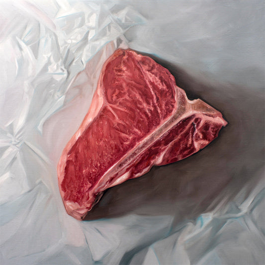 This artwork features a fresh t-bone resting upon a crinkled white wax paper sheet.