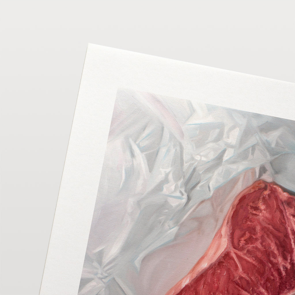 This artwork features a fresh t-bone resting upon a crinkled white wax paper sheet.