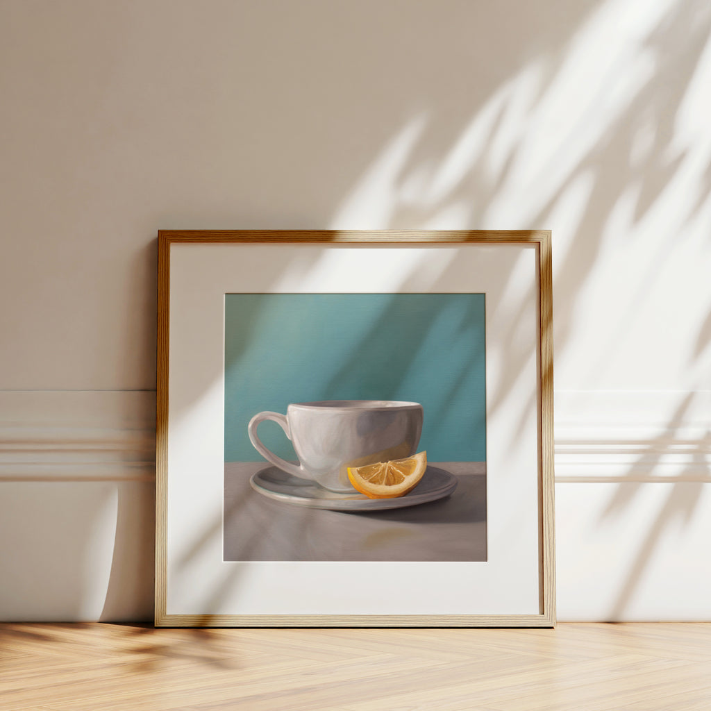 This artwork features a porcelain cup and saucer with tea and a lemon wedge with a bright turquoise background.
