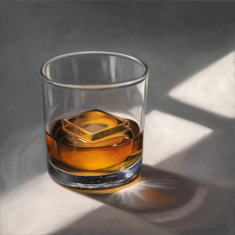 This artwork features a glass of whiskey with a single clear ice cube resting on a neutral surface with dramatic lighting from a window.