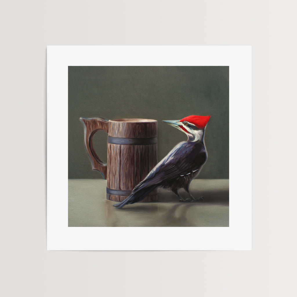 This artwork features a Pileated Woodpecker and a wooden beer tankard.This artwork is from a series of paintings that I am working on featuring birds and beverages.