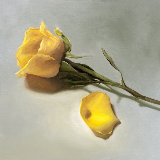 This artwork features a single yellow rose and petal laying on its side.