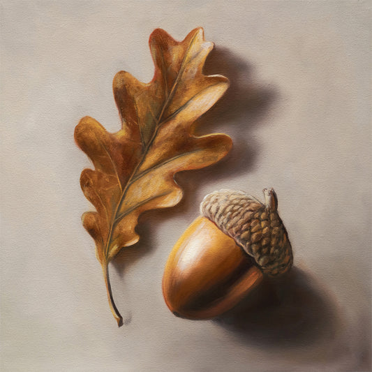 Fine art print of a detailed brown oak leaf and a golden acorn on a light background.