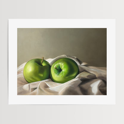 Apples & Linen Fine Art Print by Lauren Pretorius: a pair of Granny Smith apples wrapped in linen fabric with a neutral grey background.