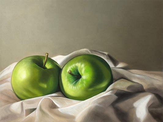 Apples & Linen Fine Art Print by Lauren Pretorius: a pair of Granny Smith apples wrapped in linen fabric with a neutral grey background.