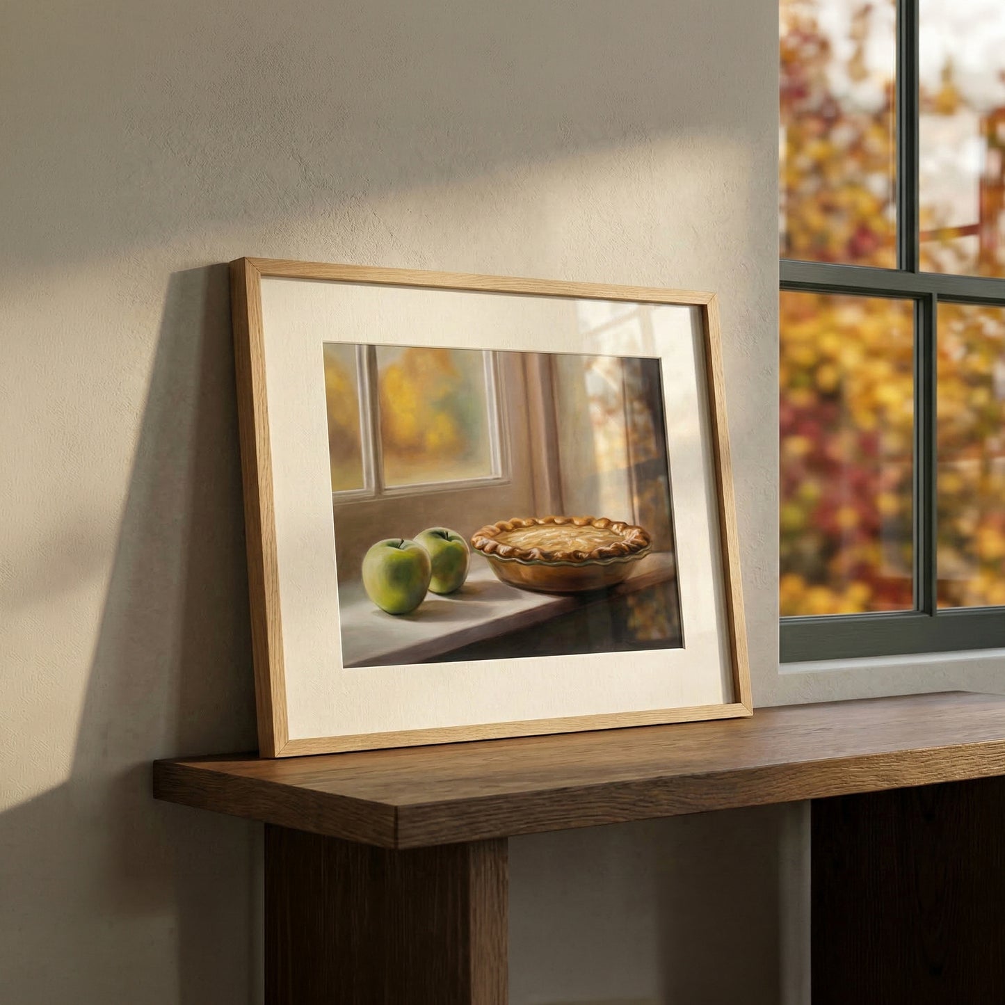 Framed fine art print of an autumn apple pie and green apples on a windowsill, with warm sunlight.