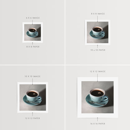 Blue Coffee Cup Fine Art Print by Lauren Pretorius: a light blue cup of coffee resting on a saucer with a spoon..