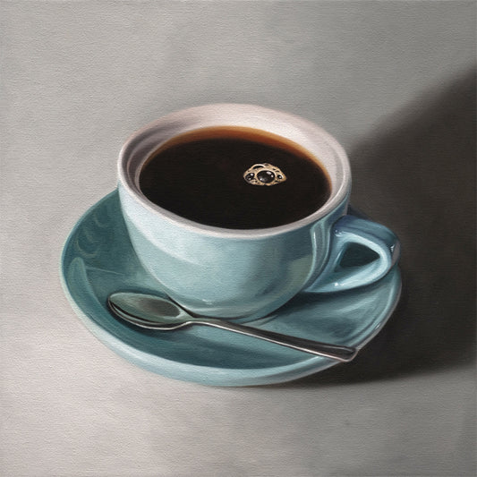 Fine art print of a light blue coffee cup filled with dark coffee, on a matching saucer with a spoon.